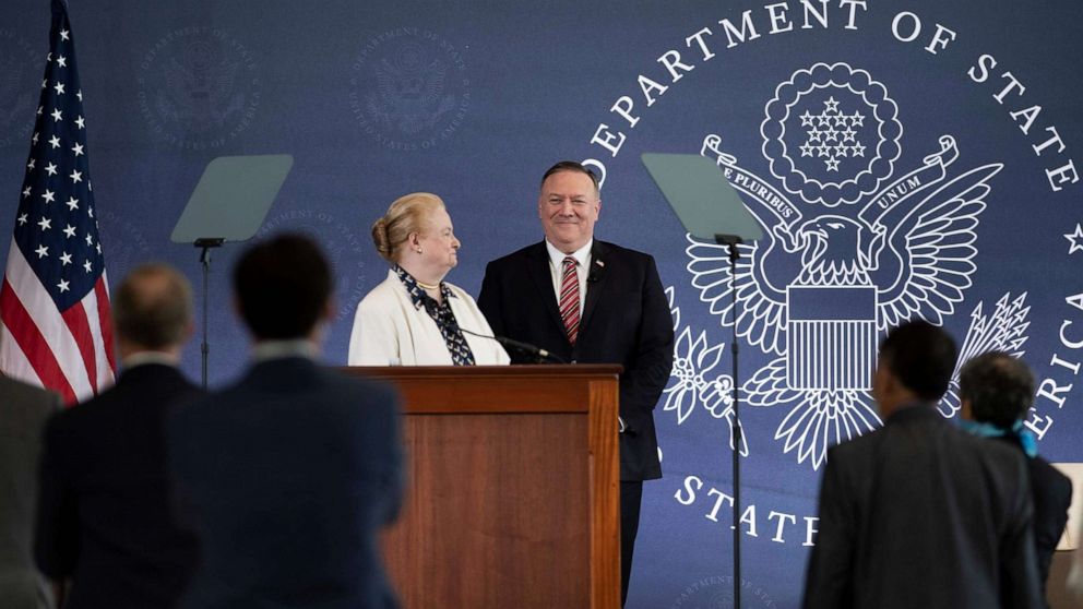 PHOTO: Secretary of State Mike Pompeo is introduced by Commission chair Mary Ann Glendon at the National Constitution Center where he spoke about the Commission on Unalienable Rights, July 16, 2020, in Philadelphia.