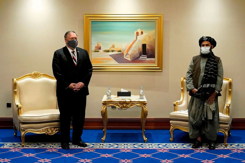 PHOTO: US Secretary of State Mike Pompeo meets with Taliban co-founder Mullah Abdul Ghani Baradar in the Qatari capital Doha, on Nov. 21, 2020, amid signs of progress in their talks as Washington speeds up its withdrawal.