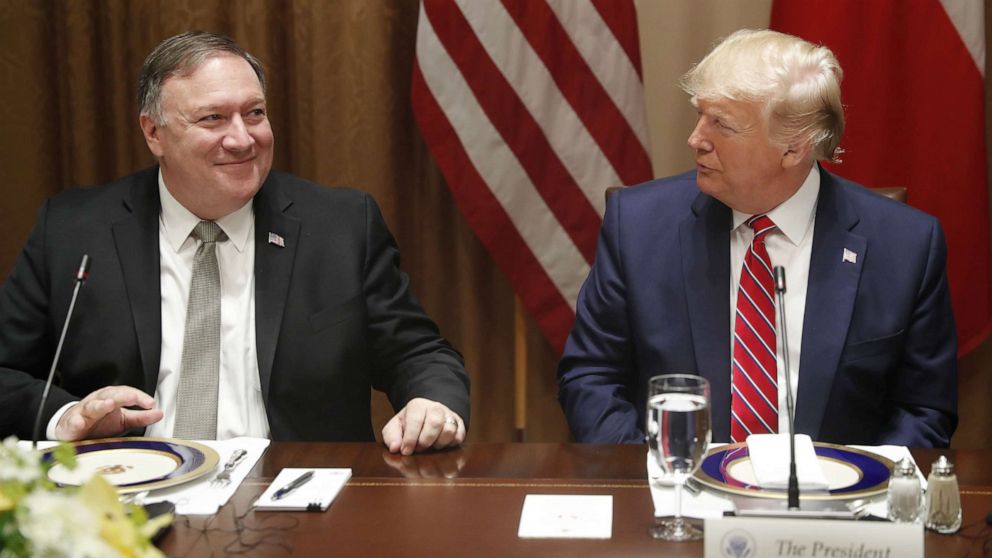 PHOTO: President Donald Trump, right, speaks with Mike Pompeo, U.S. secretary of state, left, during a luncheon at the White House in Washington, D.C. on June 12, 2019.