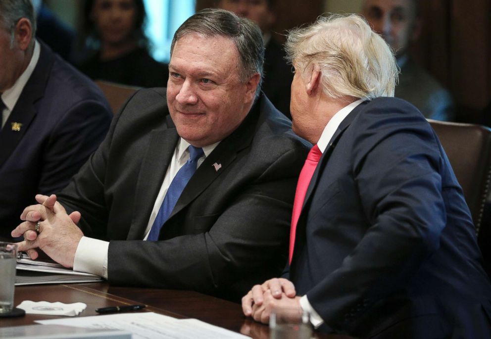 PHOTO: President Donald Trump talks to Secretary of State Mike Pompeo during a cabinet meeting in the Cabinet Room of the White House, Aug.t 16, 2018.