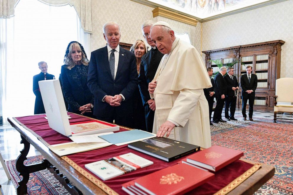 PHOTO: Pope Francis exchange gifts with with U.S. President Joe Biden and first lady Jill Biden, left, during a private audience at The Vatican, Oct. 29, 2021.