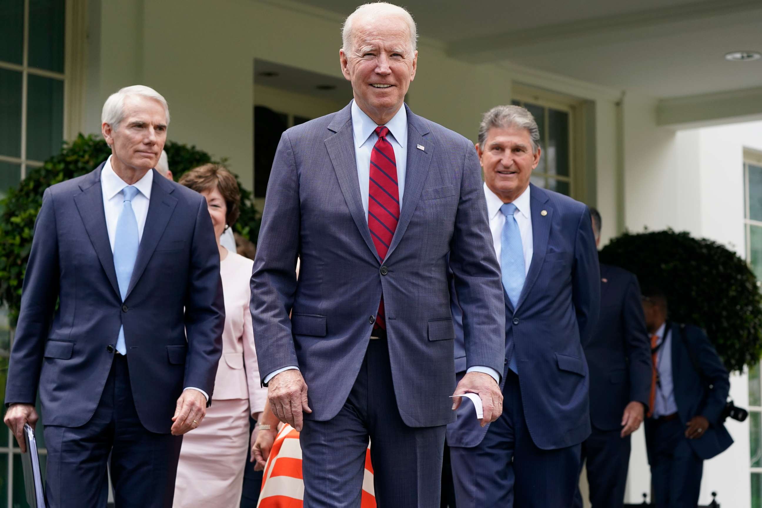 PHOTO: President Joe Biden and, from left, Sen. Rob Portman, R-Ohio, Sen. Susan Collins, R-Maine, and Sen. Joe Manchin, D-W.Va., walk out to speak to the media on June 24, 2021, outside the White House in Washington. 