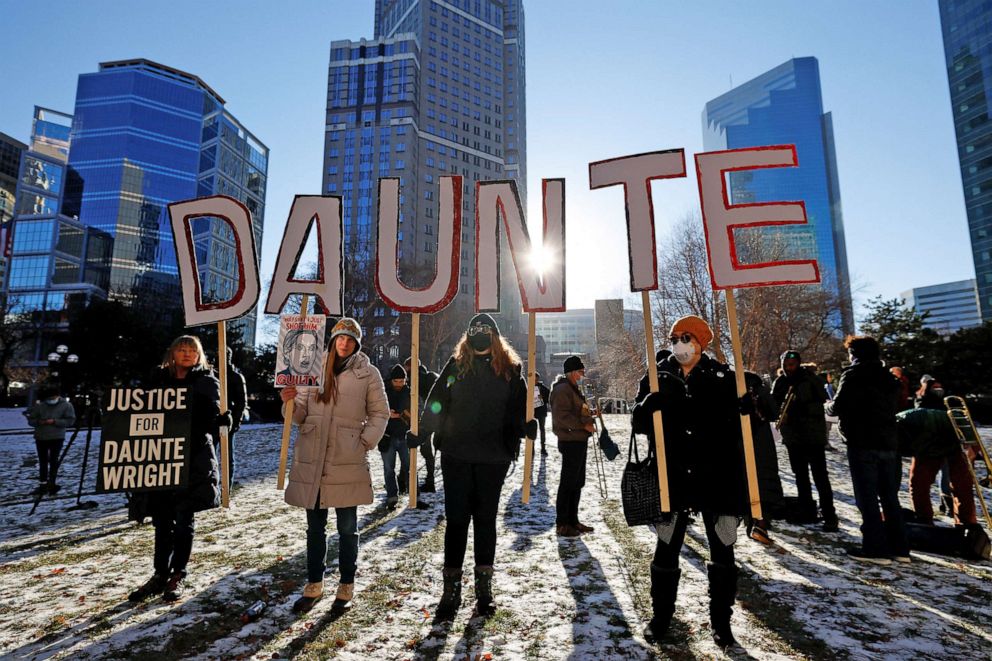 PHOTO: People react to the outcome in the manslaughter trial of Kimberly Potter, outside the Hennepin County Courthouse in Minneapolis, Minn., Dec. 23, 2021. Potter was found guilty in the fatal shooting of Daunte Wright.