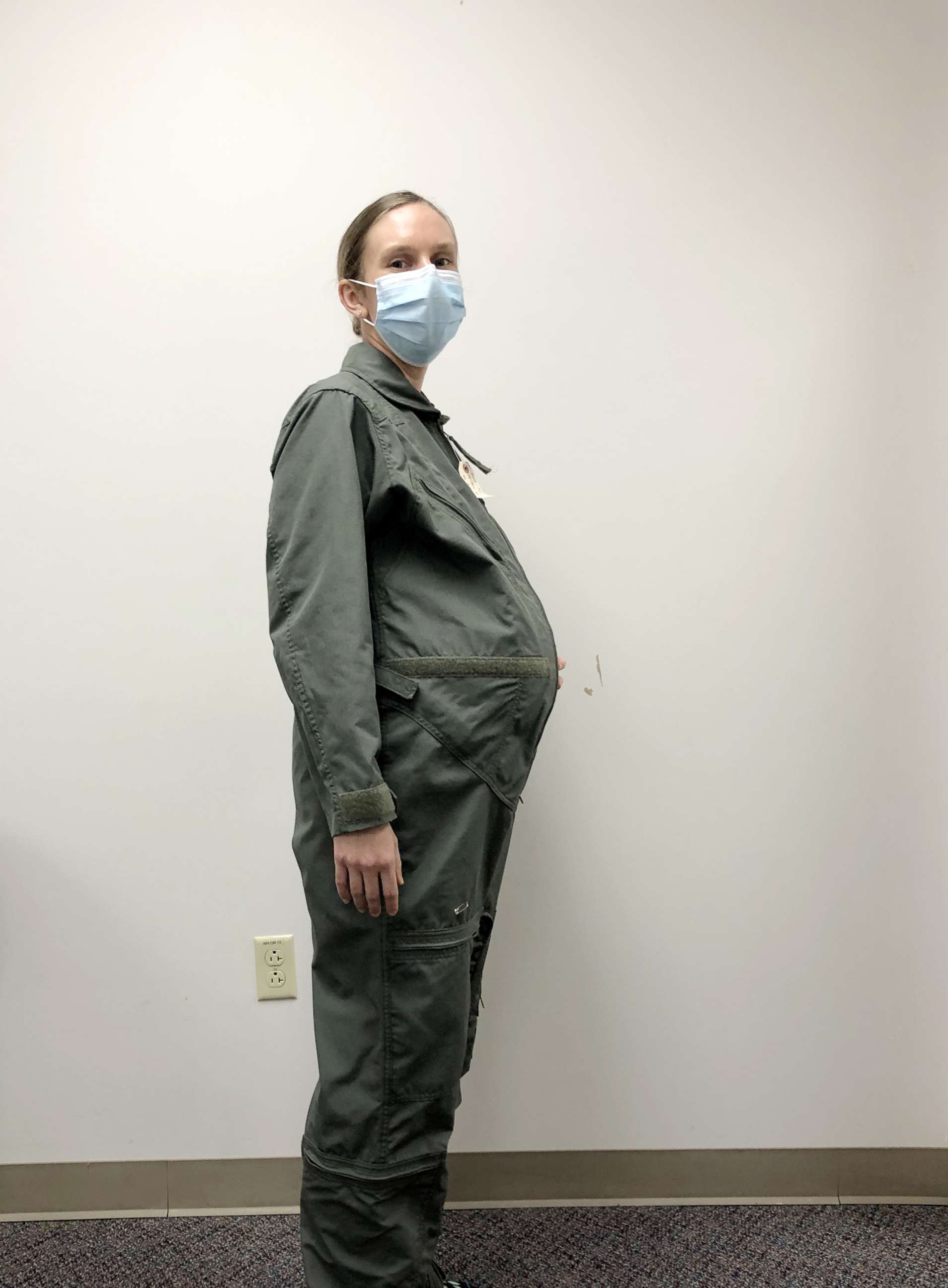 PHOTO:  1st Lt. Avery Thomson, the lead program manager for Maternity Development efforts in the Air Force Uniform Office, models a Maternity Flight Duty Uniform while wearing an artificial pregnancy bump.
