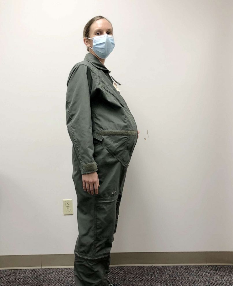 PHOTO:  1st Lt. Avery Thomson, the lead program manager for Maternity Development efforts in the Air Force Uniform Office, models a Maternity Flight Duty Uniform while wearing an artificial pregnancy bump.