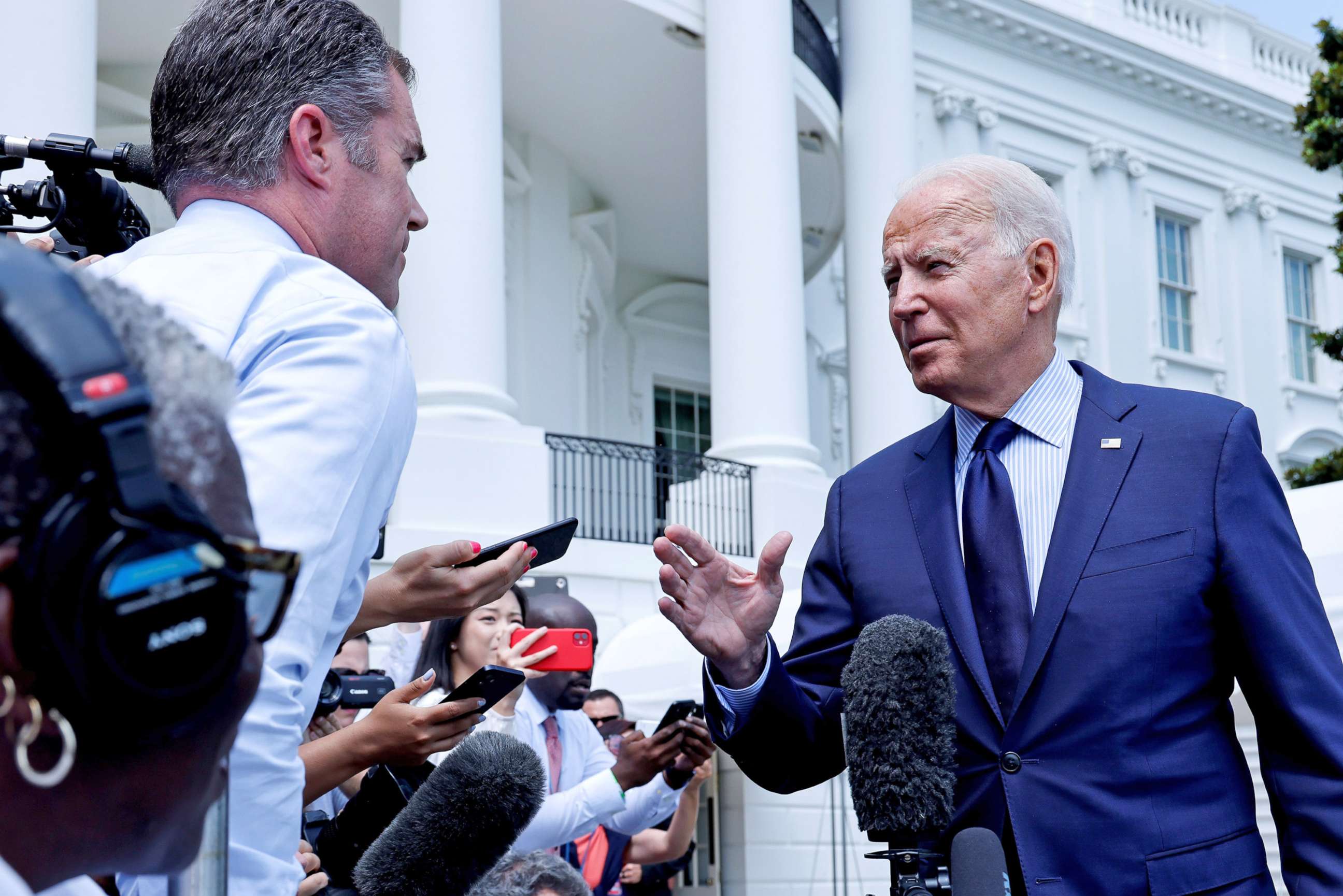 PHOTO: President Joe Biden talks to the media as he departs for a weekend visit to Camp David from the White House in Washington, D.C., July 16, 2021.