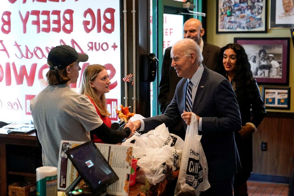 PHOTO: President Joe Biden chats with an employee while picking up a meal at Primanti Bros. restaurant, Oct. 20, 2022, in Moon Township, Pa.