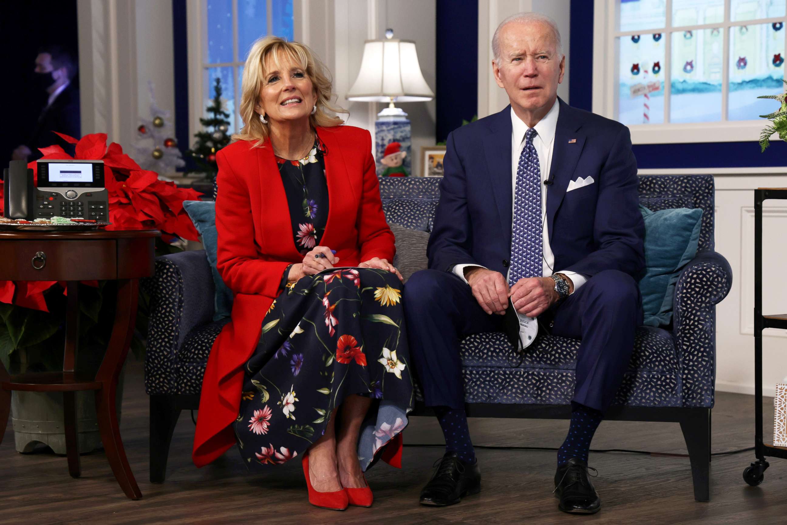 PHOTO: President Joe Biden and first lady Dr. Jill Biden participate in an event to call NORAD and track the path of Santa Claus on Christmas Eve in the South Court Auditorium of the Eisenhower Executive Building, Dec. 24, 2021 in Washington, DC.