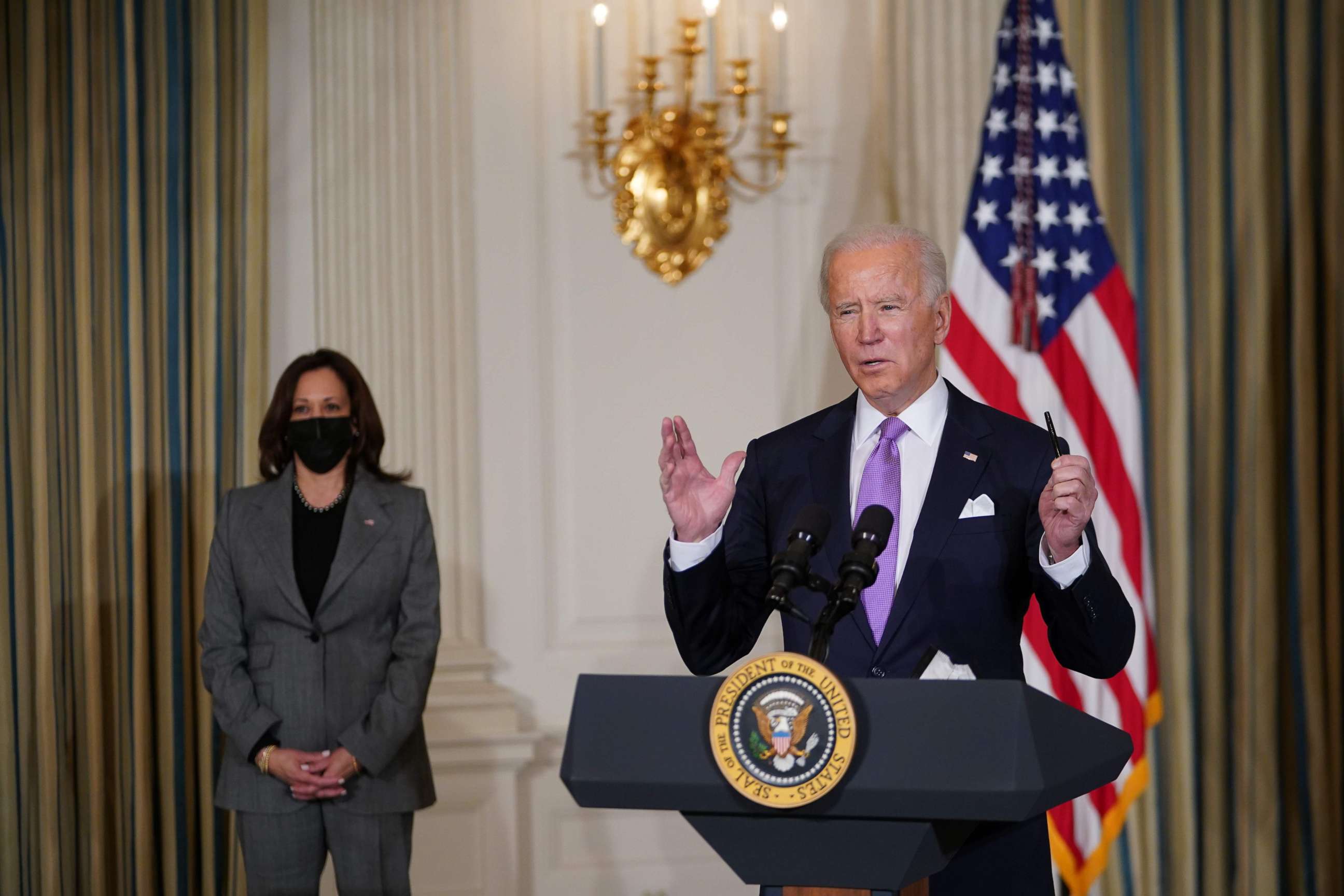 PHOTO: President Joe Biden arrives to speak on racial equity with Vice President Kamala Harris before signing executive orders in the State Dining Room of the White House in Washington, DC, Jan. 26, 2021.