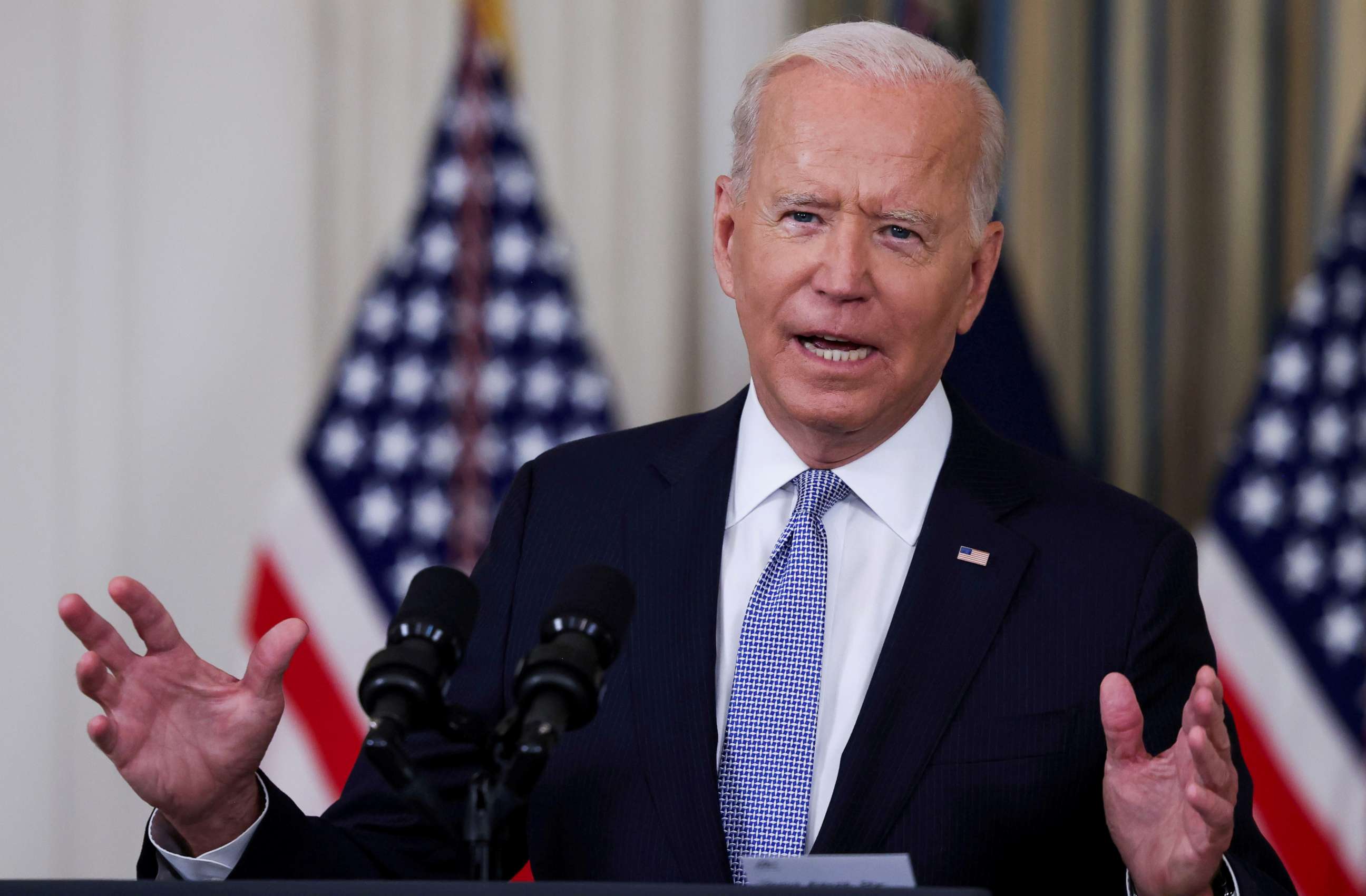 PHOTO: President Joe Biden responds to a question from a reporter after speaking about coronavirus disease (COVID-19) vaccines and booster shots in the State Dining Room at the White House in Washington, Sept. 24, 2021.