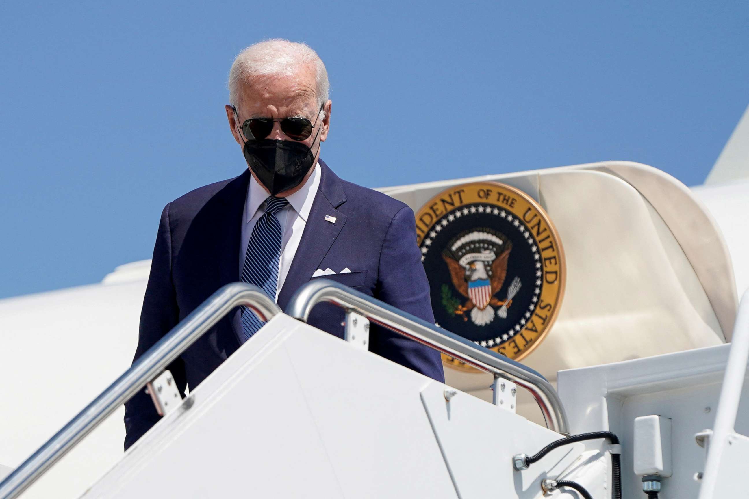 PHOTO: President Joe Biden walks from Air Force One as he returns from Kiawah Island, South Carolina, at Joint Base Andrews in Maryland, Aug 16, 2022.