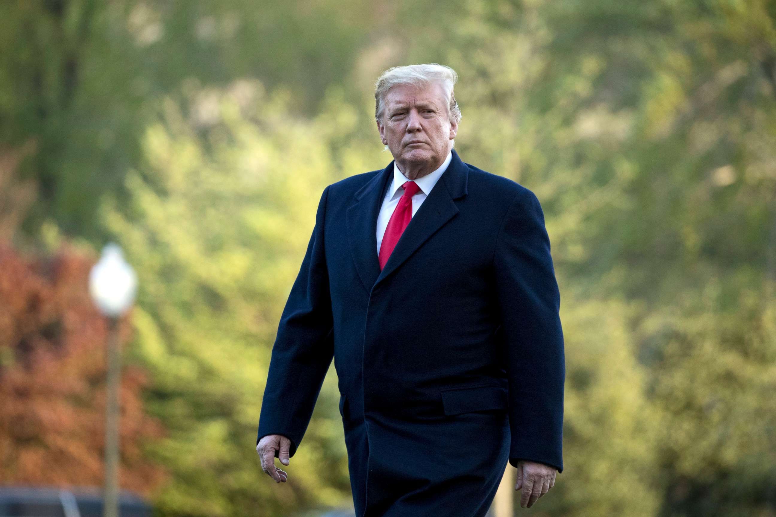 PHOTO: President Donald Trump walks on the South Lawn as he arrives at the White House in Washington, April 15, 2019.