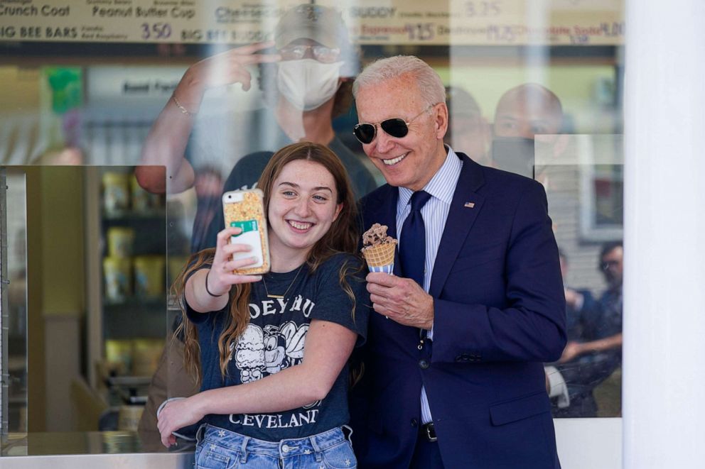 PHOTO: President Joe Biden poses for a photo with an employee at Honey Hut Ice Cream after ordering ice cream, on May 27, 2021, in Cleveland.