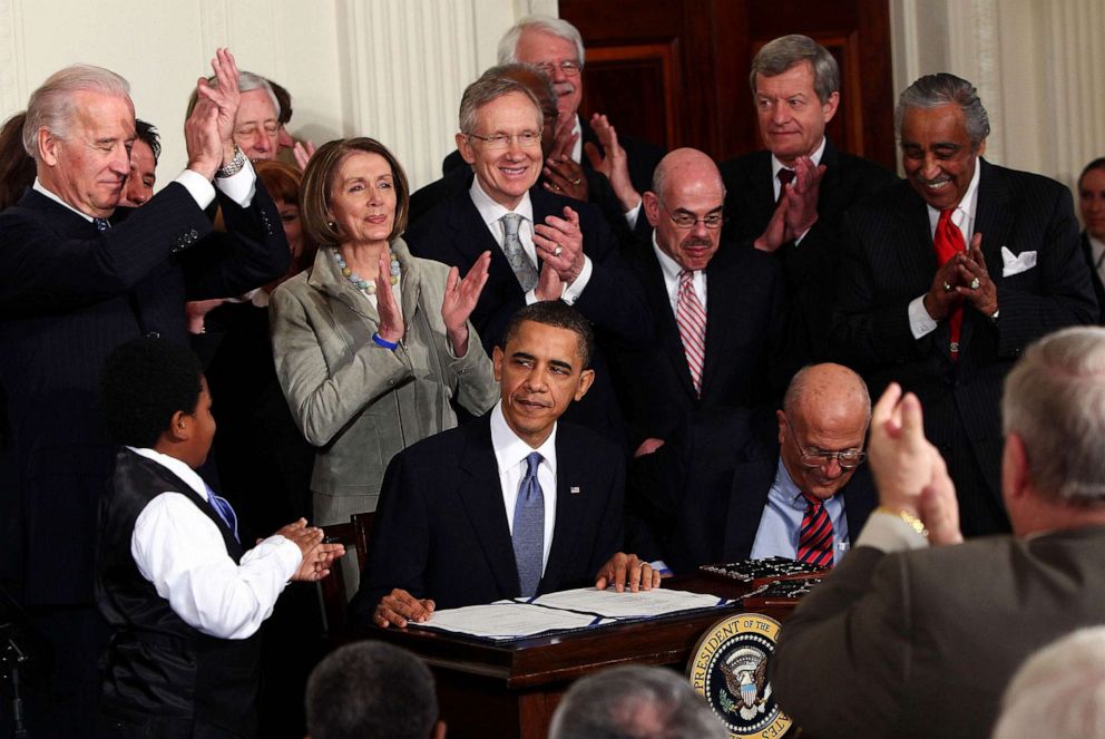 PHOTO: FILE - President Barack Obama is applauded after signing the Affordable Health Care for America Act during a ceremony with fellow Democrats in the East Room of the White House, March 23, 2010 in Washington, DC.