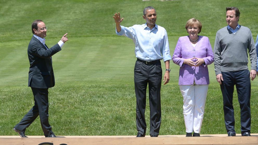 PHOTO: French President Francois Hollande, President Barack Obama, German Chancellor Angela Merkel, and British Prime Minister David Cameron arrive to pose for the family photo during the G8 Leaders Summit May 19, 2012 at Camp David in Maryland.