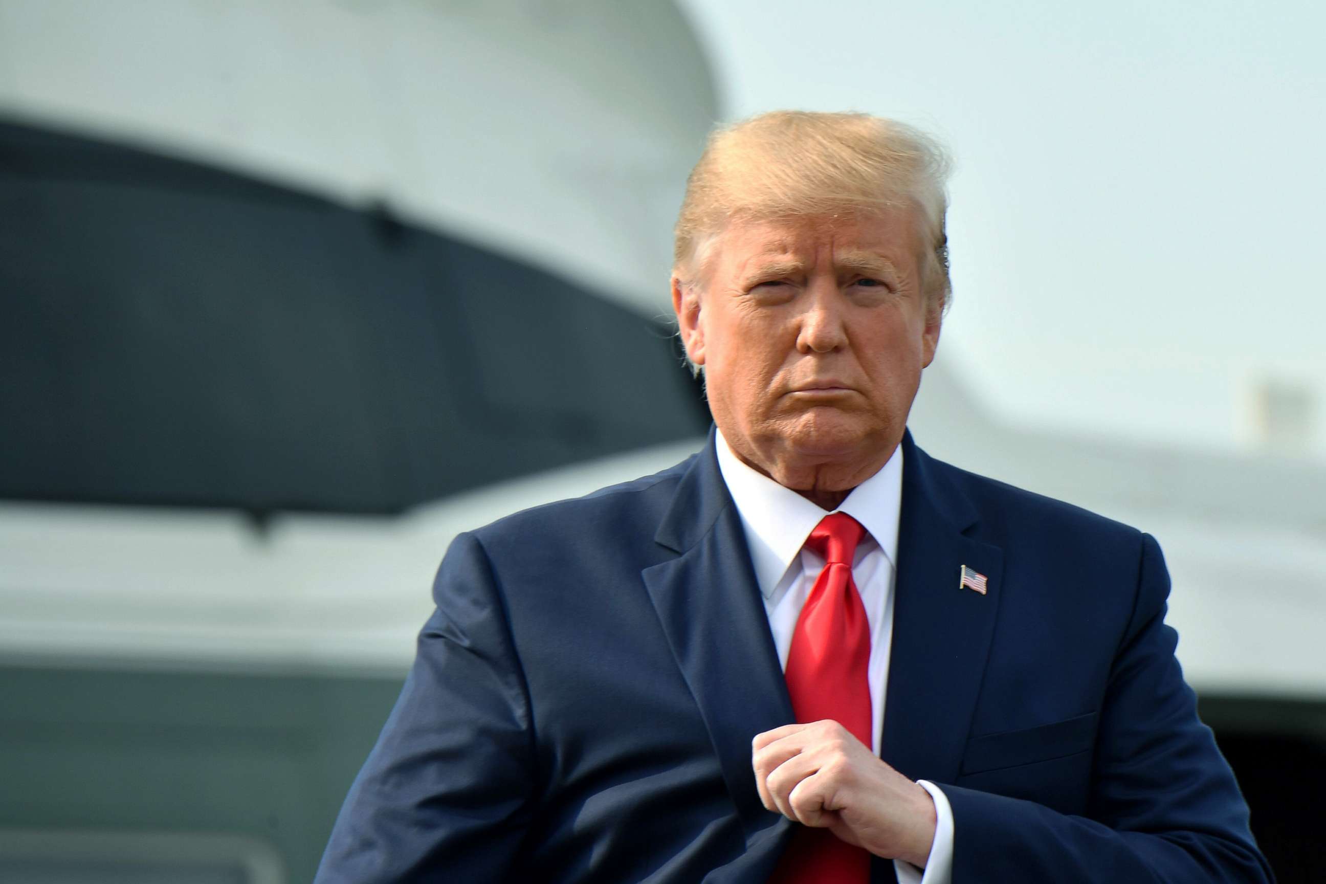 PHOTO: President Donald Trump steps off Marine One upon arrival to Manchester, New Hampshire, to hold a "Keep America Great" campaign rally, Aug. 15, 2019.