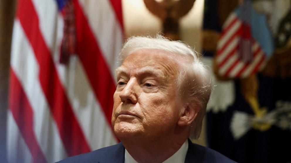PHOTO: President Donald Trump looks on on the day of a meeting with U.S. ambassadors at the White House in Washington, D.C., March 25, 2025.