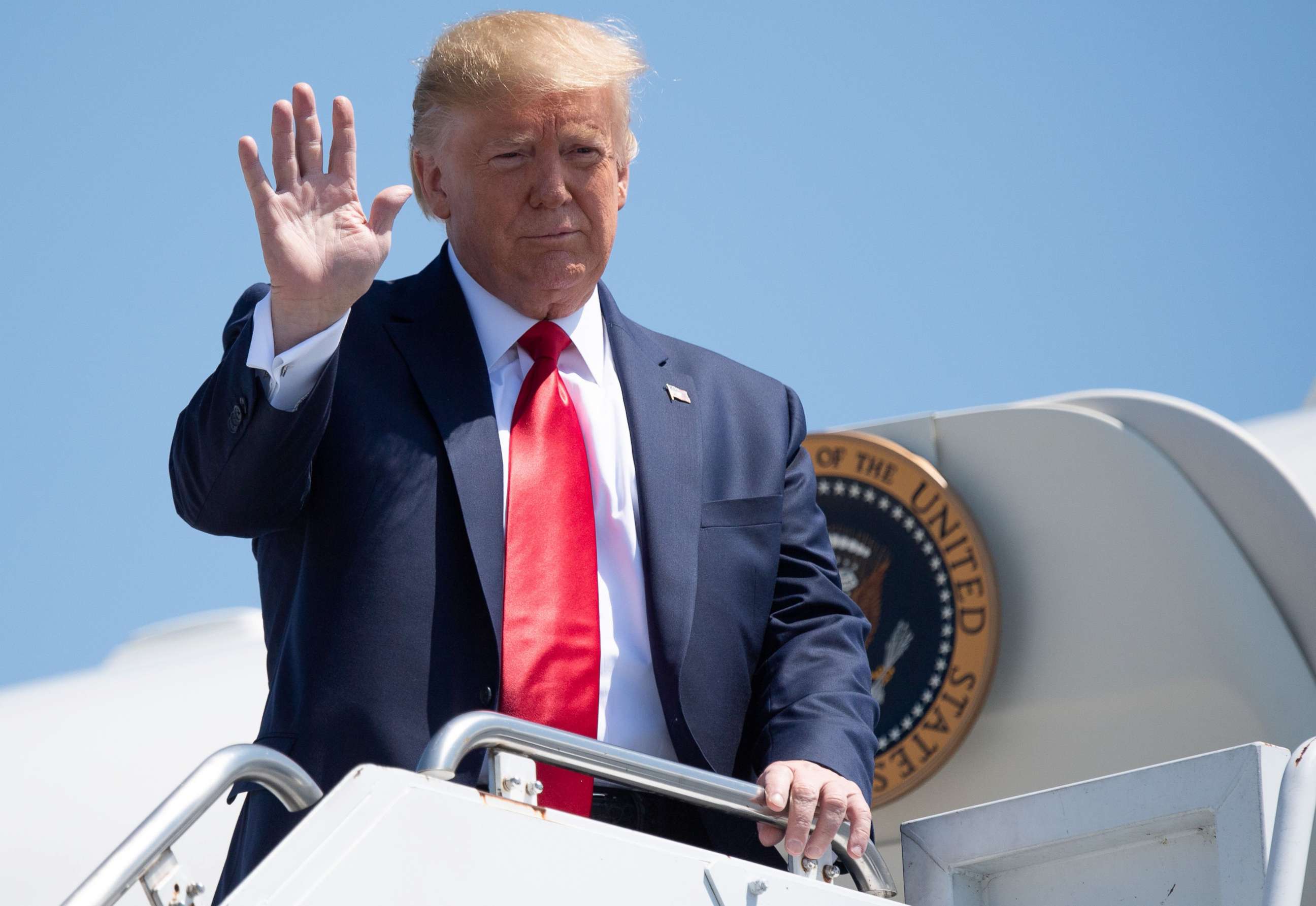 PHOTO: President Donald Trump disembarks from Air Force One upon arrival at Francis S. Gabreski Airport in Westhampton Beach, New York, Aug. 9, 2019, as he arrives for campaign fundraisers.