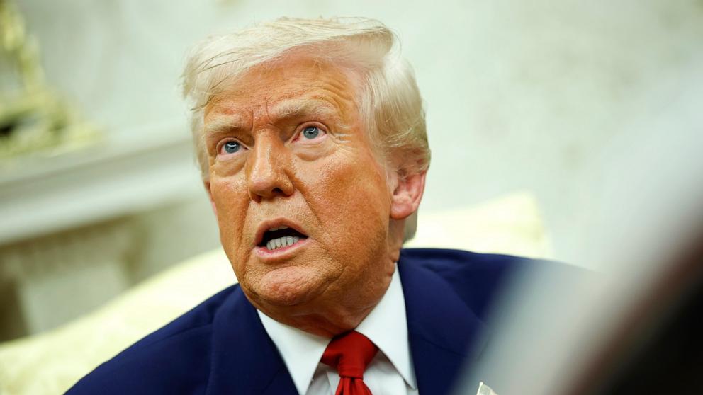 PHOTO: President Donald Trump answers a reporters question during a meeting with Israeli Prime Minister Benjamin in the Oval Office of the White House on April 7, 2025 in Washington, DC.