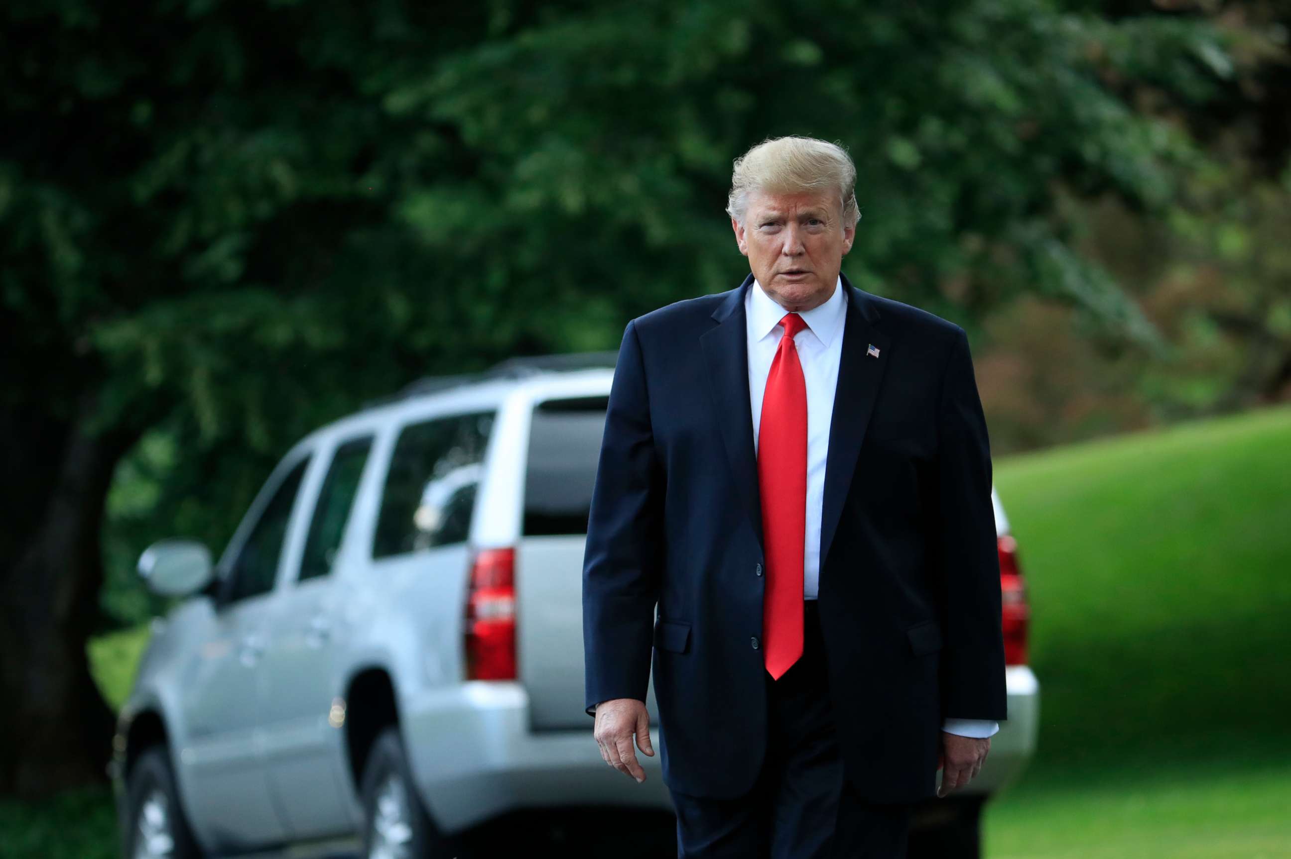 PHOTO: President Donald Trump walks towards the journalist gathered for his departure at the White House in Washington, May 20, 2019.
