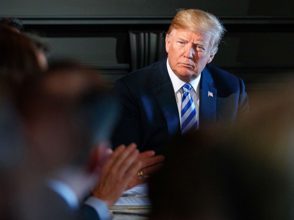 PHOTO: President Donald Trump listens during a meeting with state leaders about prison reform, Aug. 9, 2018, at Trump National Golf Club in Bedminster, N.J.