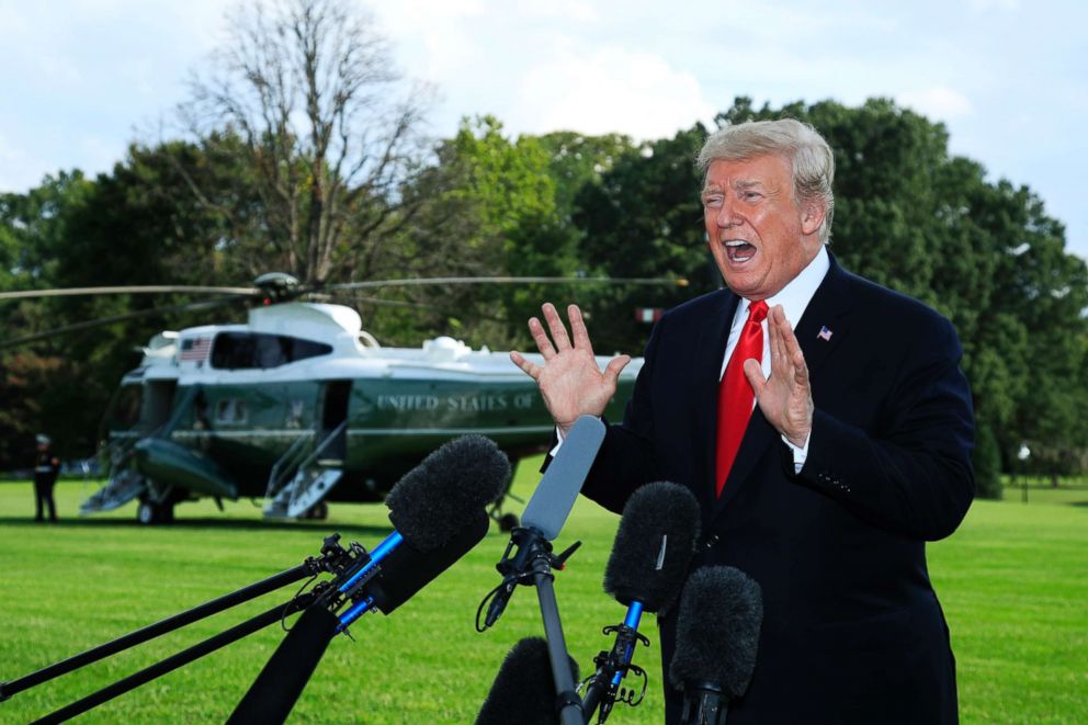 PHOTO: President Donald Trump speaks to reporters on the South Lawn before leaving the White House in Washington, Oct. 9, 2018.