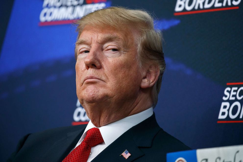 PHOTO: President Donald Trump listens during an event on immigration alongside family members affected by crime committed by undocumented immigrants, at the South Court Auditorium on the White House complex in Washington, June 22, 2018.