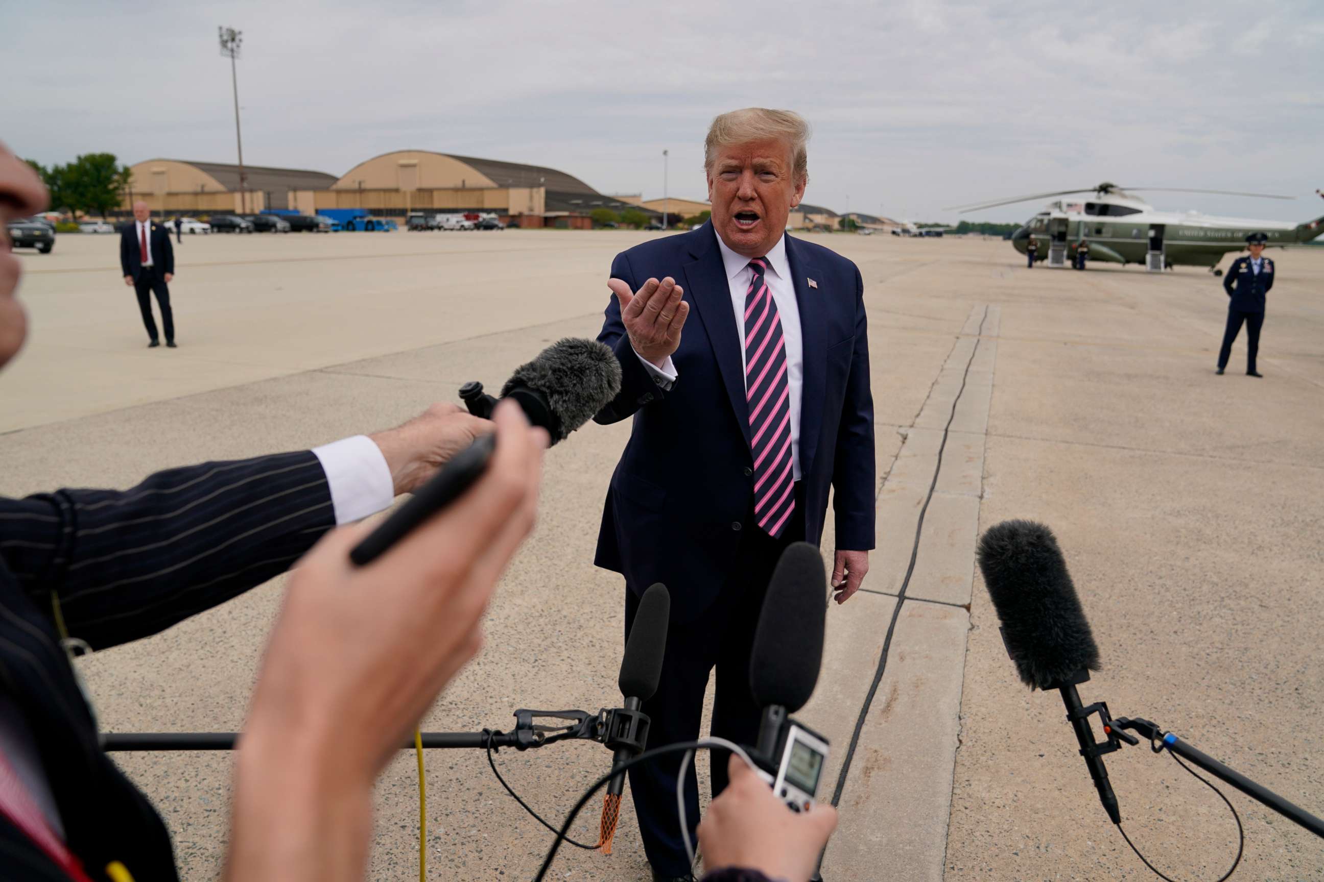 PHOTO: President Donald Trump talks to the media before boarding Air Force One for a trip to Phoenix to visit a Honeywell plant that manufactures protective equipment, May 5, 2020, in Andrews Air Force Base, Md.