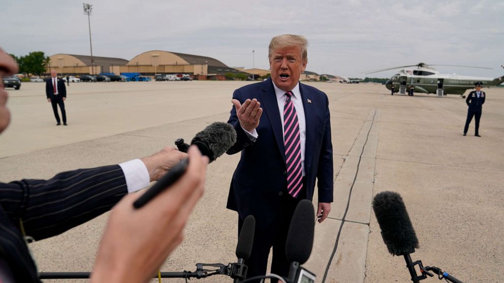 PHOTO: President Donald Trump talks to the media before boarding Air Force One for a trip to Phoenix to visit a Honeywell plant that manufactures protective equipment, May 5, 2020, in Andrews Air Force Base, Md.