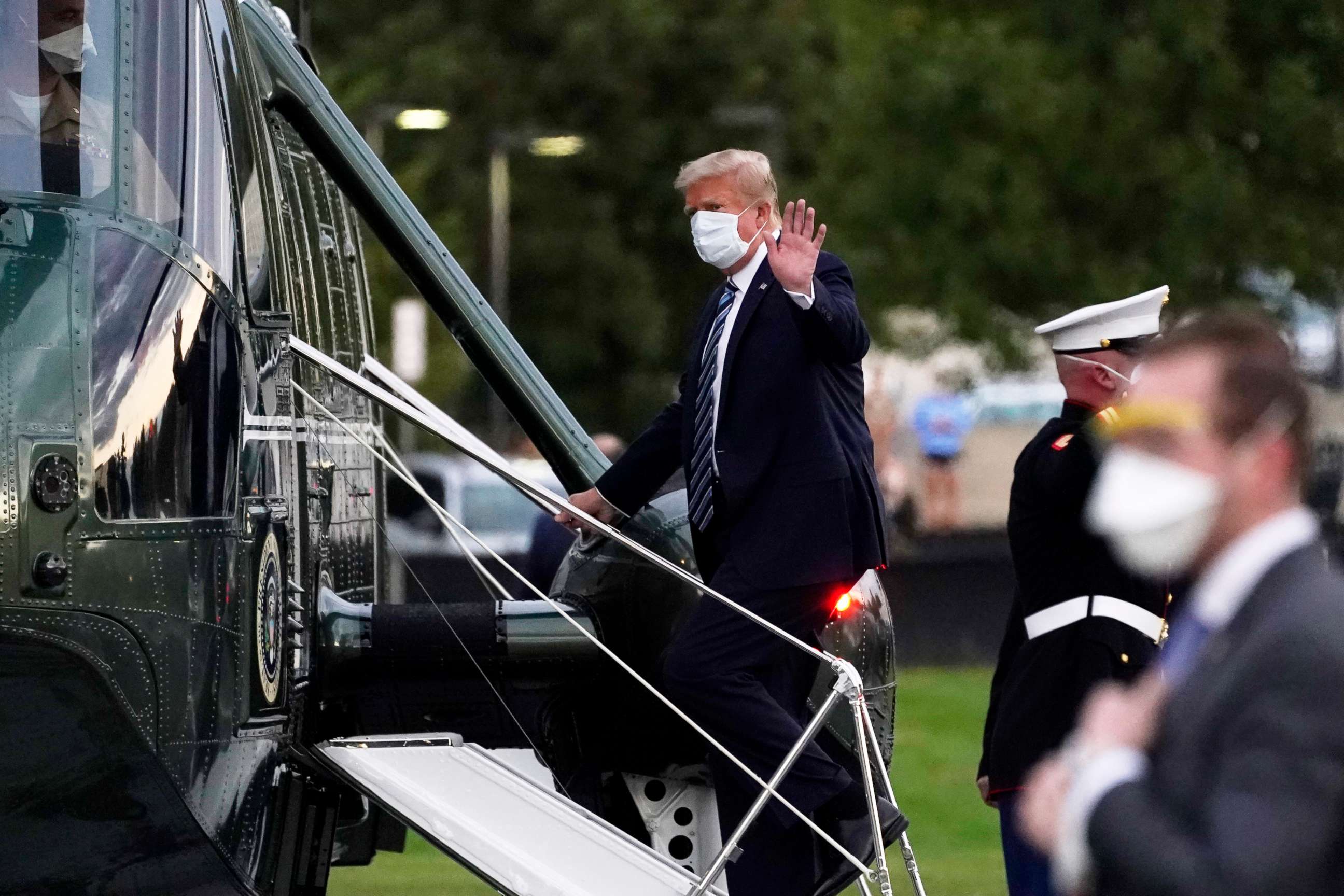 PHOTO: President Donald Trump boards Marine One at Walter Reed National Military Medical Center after receiving treatment for coronavirus in Bethesda, Md.