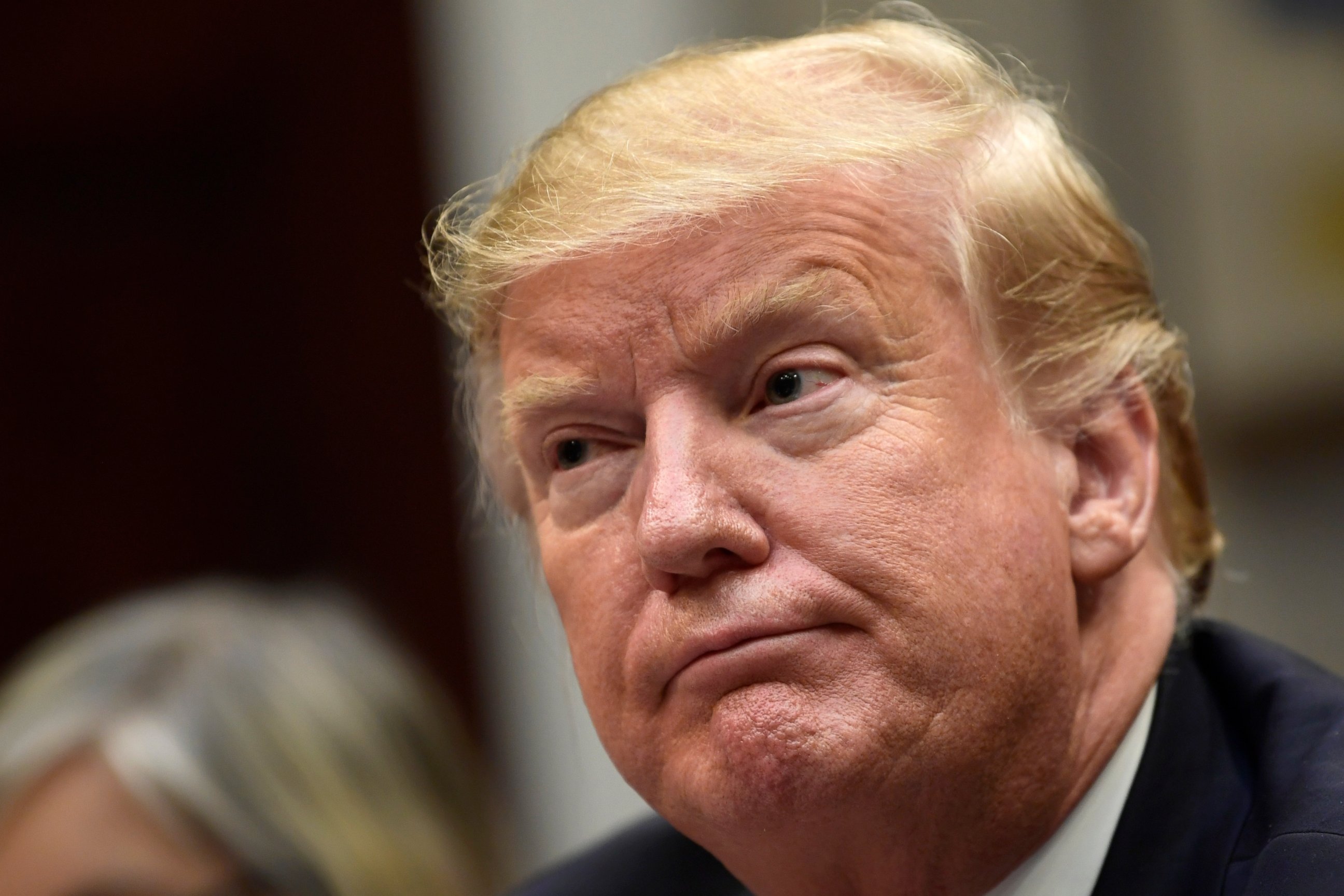 PHOTO: President Donald Trump listens during a meeting with Hispanic pastors in the Roosevelt Room of the White House in Washington, Friday, Jan. 25, 2019.