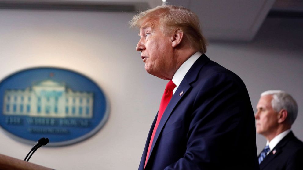 PHOTO: President Donald Trump speaks about the coronavirus in the James Brady Press Briefing Room of the White House, April 9, 2020, in Washington, as Vice President Mike Pence listens.