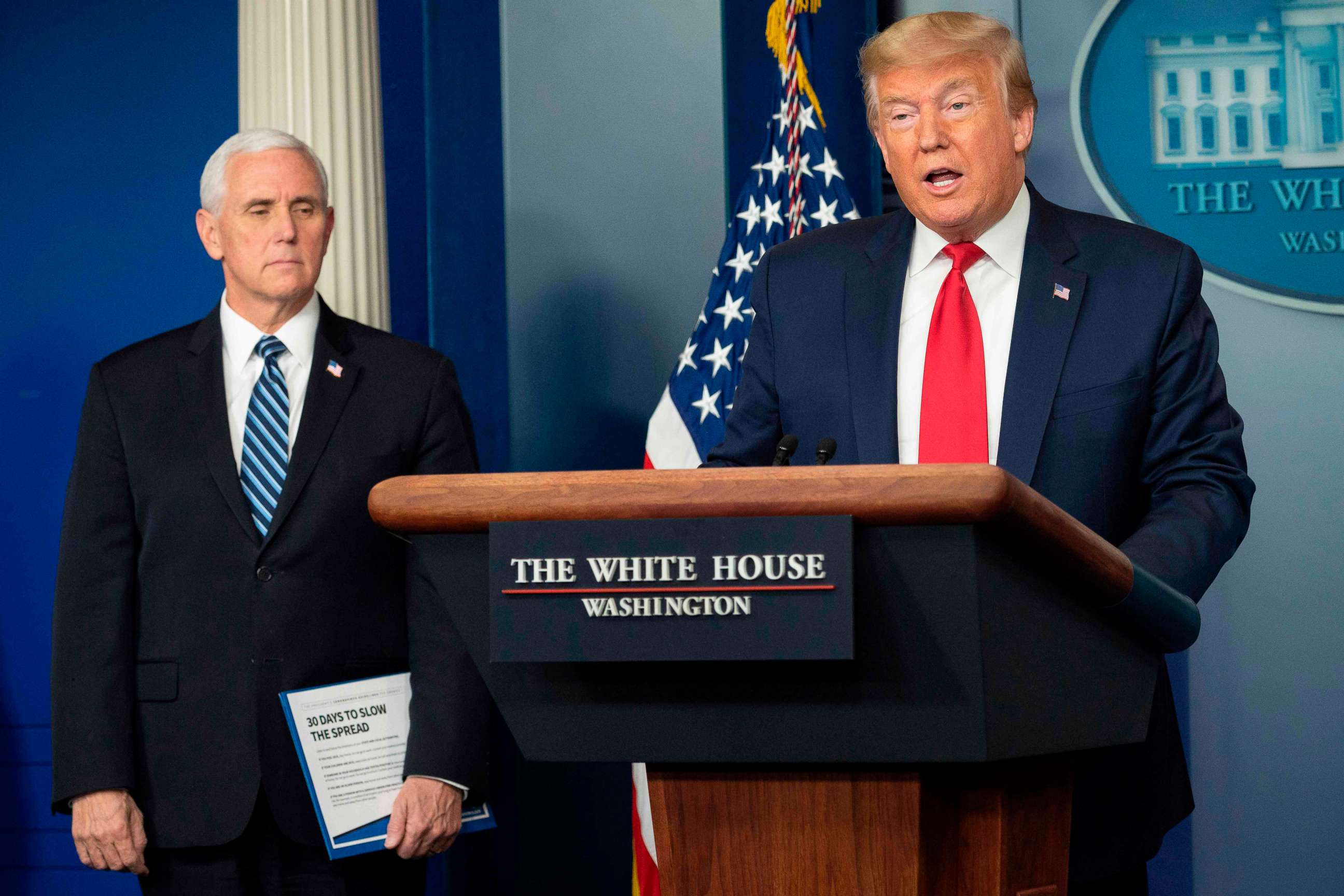 PHOTO: Vice President Mike Pence listens as President Donald Trump speaks during the daily briefing on the novel coronavirus, which causes COVID-19, in the Brady Briefing Room at the White House, April 9, 2020, in Washington, DC.
