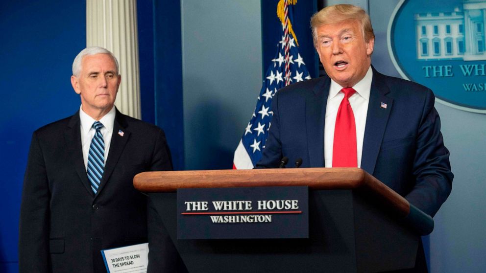 PHOTO: Vice President Mike Pence listens as President Donald Trump speaks during the daily briefing on the novel coronavirus, which causes COVID-19, in the Brady Briefing Room at the White House, April 9, 2020, in Washington, DC.