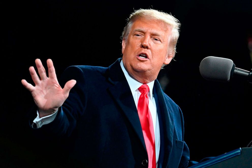 PHOTO: President Donald Trump gestures as he speaks at a rally to support Republican Senate candidates at Valdosta Regional Airport in Valdosta, Georgia, Dec. 5, 2020.