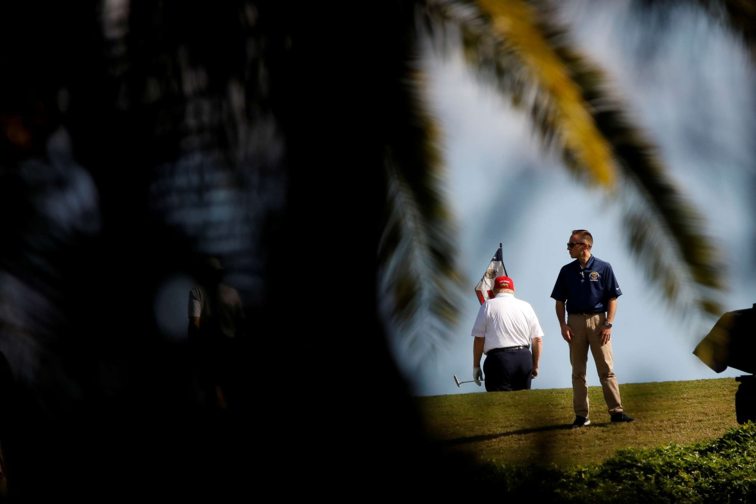 PHOTO: President Donald Trump plays golf at the Trump International Golf Club in West Palm Beach, Fla., Dec. 27, 2020.