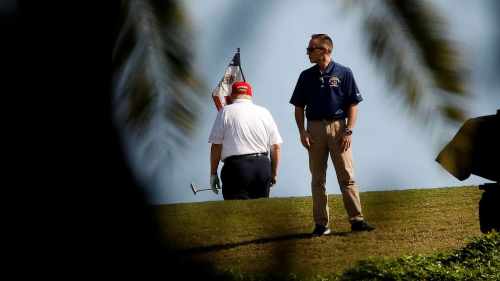 PHOTO: President Donald Trump plays golf at the Trump International Golf Club in West Palm Beach, Fla., Dec. 27, 2020.