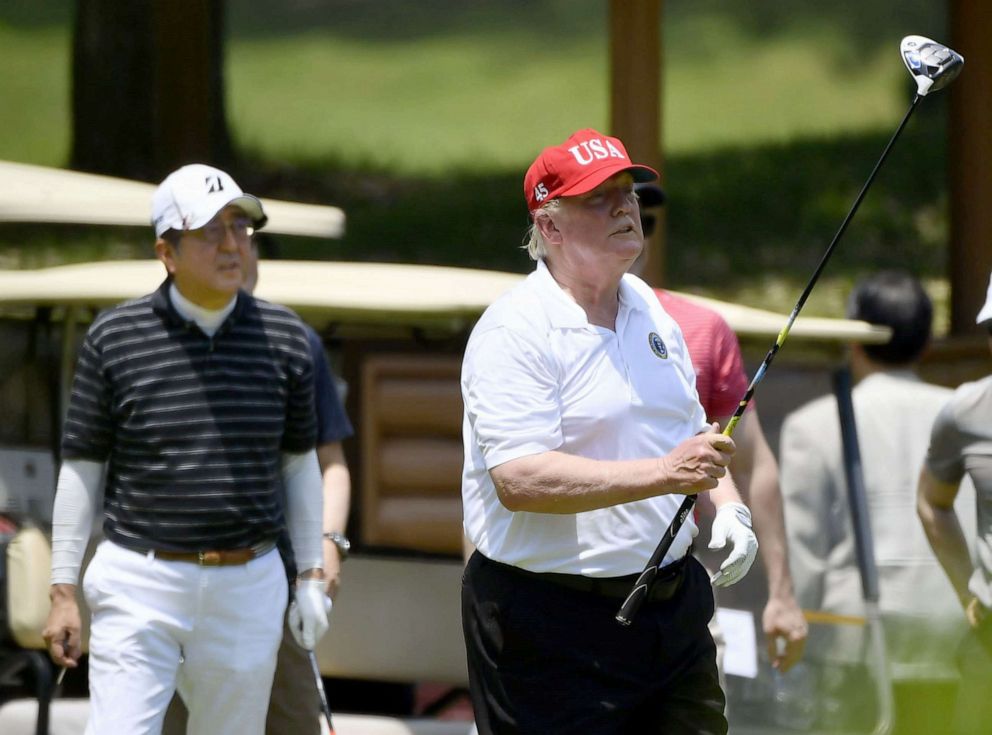 PHOTO: President Donald Trump and Japanese Prime Minister Shinzo Abe play golf at Mobara Country Club in Chiba Prefecture, Tokyo, May 26, 2019.