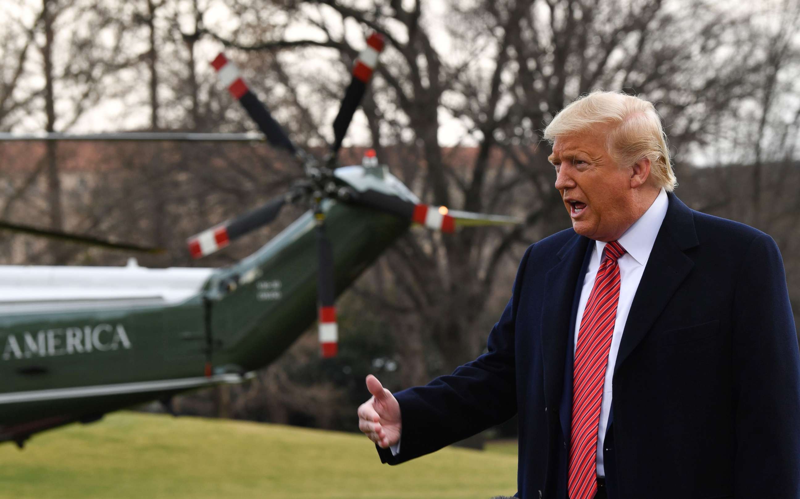 PHOTO: President Donald Trump speaks to the media prior to his departure from the South Lawn of the White House in Washington, DC, Feb. 28, 2020.