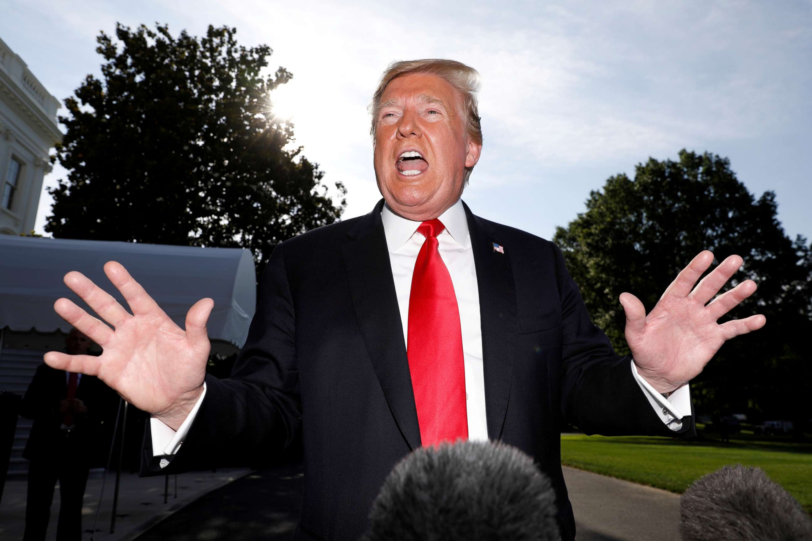 PHOTO: President Donald Trump  speaks to the news media as he departs for travel to Colorado from the White House in Washington, May 30, 2019.