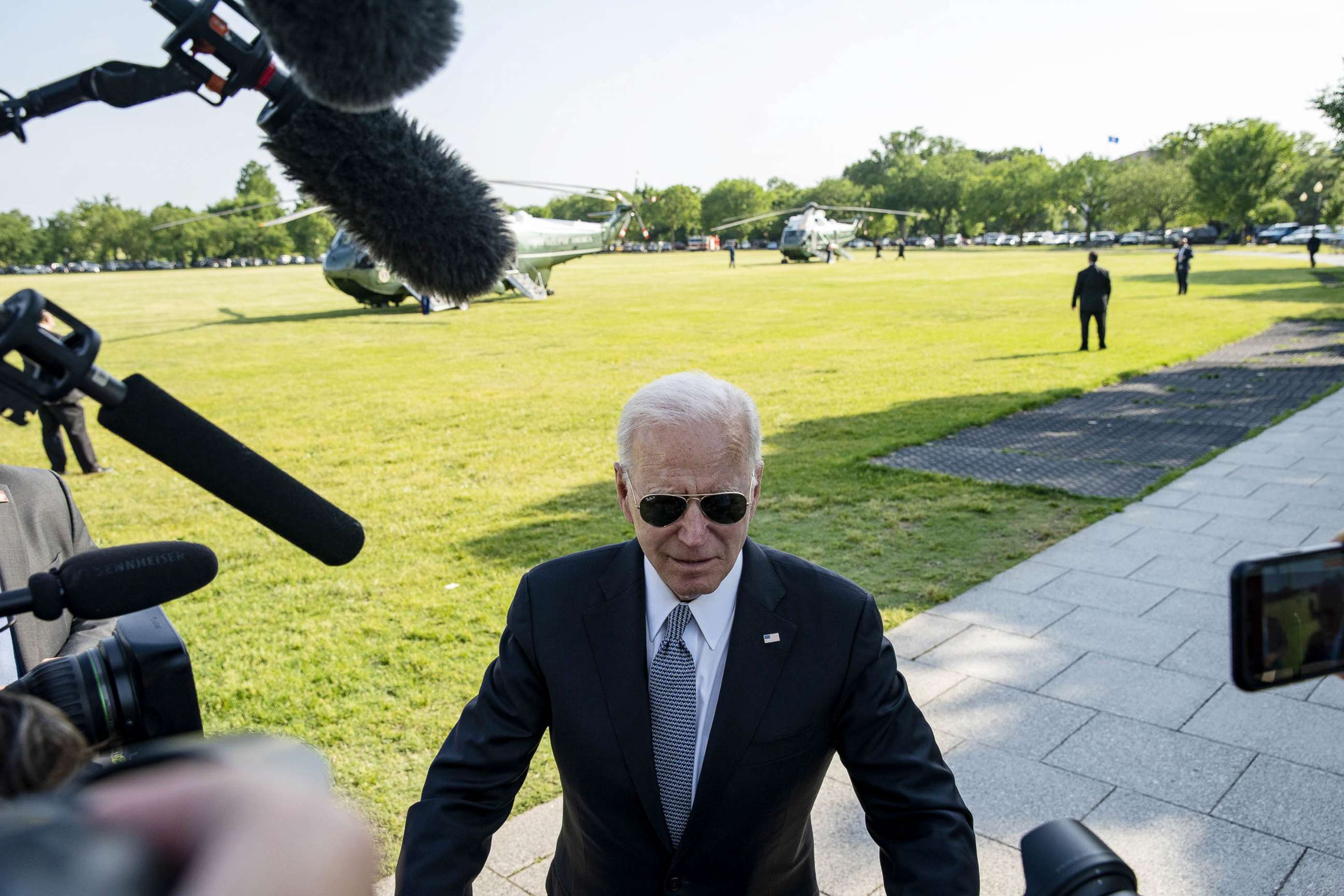PHOTO: President Joe Biden speaks with members of the media before boarding Marine One on the Ellipse near the White House in Washington, May 25, 2021. 