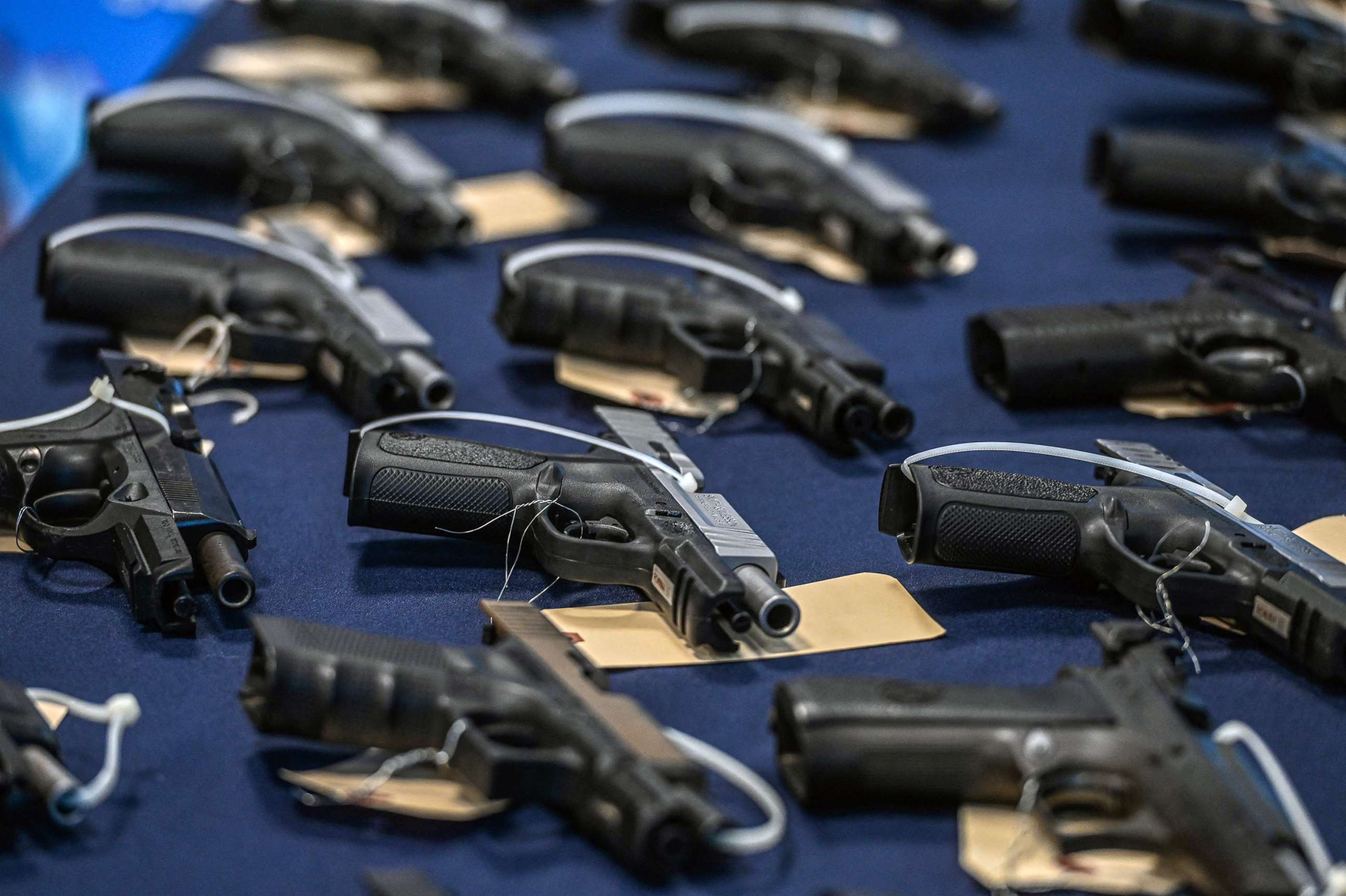 PHOTO: Guns seized in federal law enforcement actions are displayed during a press conference to announce a crackdown on firearms and ammunition smuggling to Haiti and the Caribbean at the Homeland Security Investigations offices in Miami, Aug. 17, 2022.