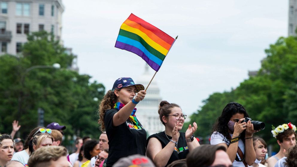 PHOTO: In this June 12, 2021, file photo, people attend a Capital Pride rally at Freedom Plaza to celebrate the LGBTQ community, in Washington, D.C.