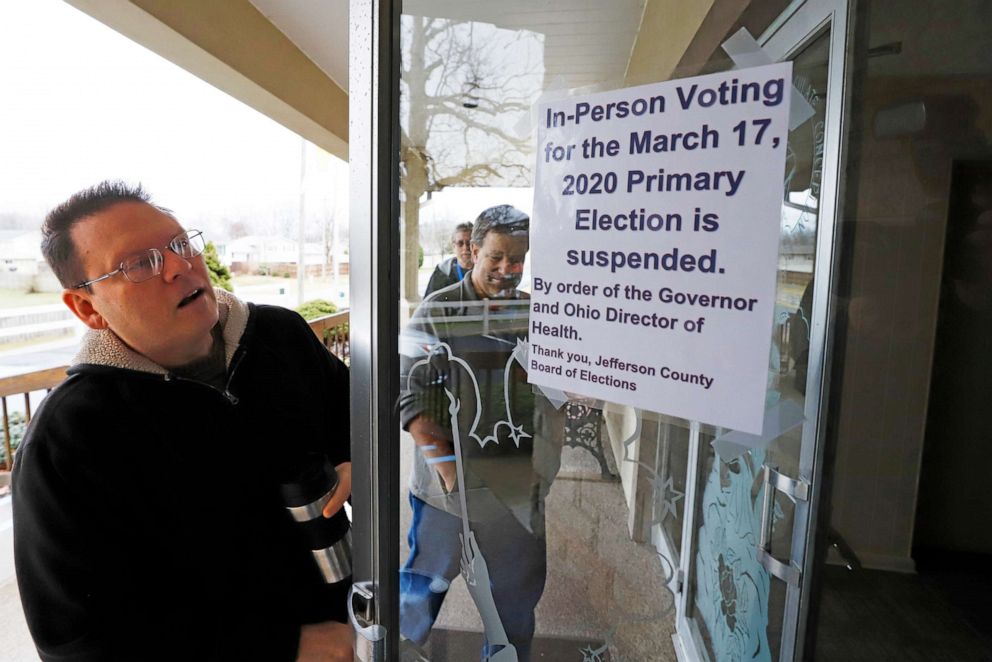 PHOTO: Jefferson County Elections officials arrive to pack up the polling place at Our Lady of Lourdes church in Wintersville, Ohio, March 17, 2020.