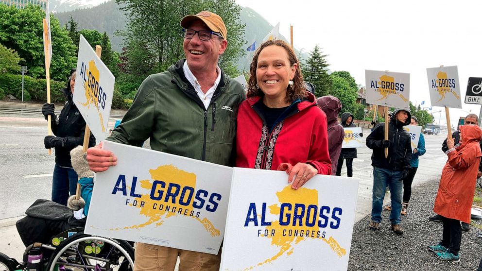 PHOTO: Al Gross, an independent running for Alaska's U.S. House seat, poses beside his wife, Monica Gross in Juneau, ALa., June 11, 2022.