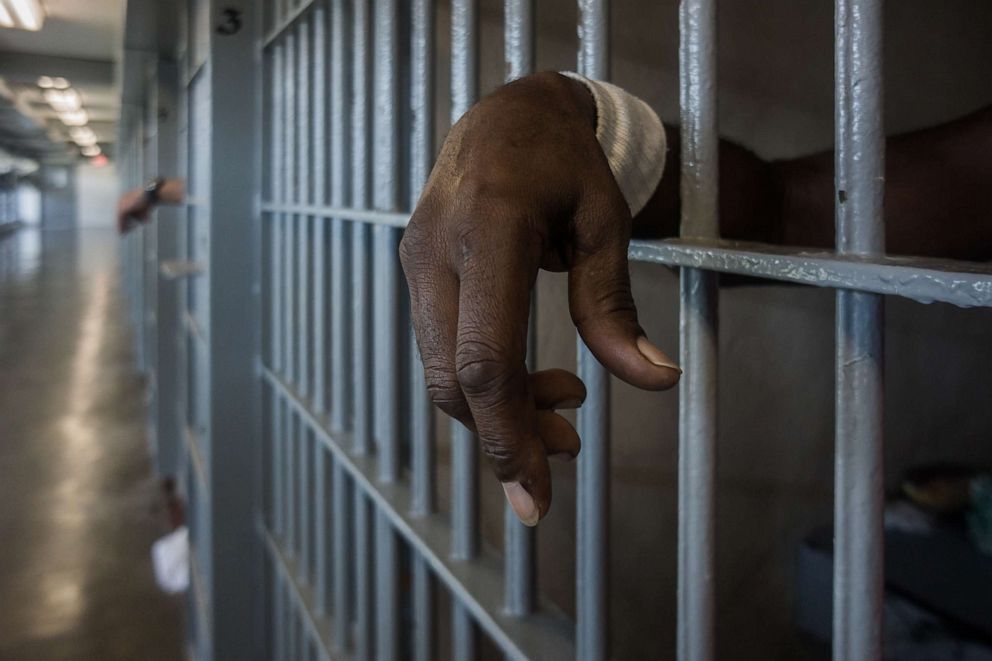 PHOTO: A prisoner's hands inside a punishment cell wing at Angola prison in Louisiana, Oct. 14, 2013.