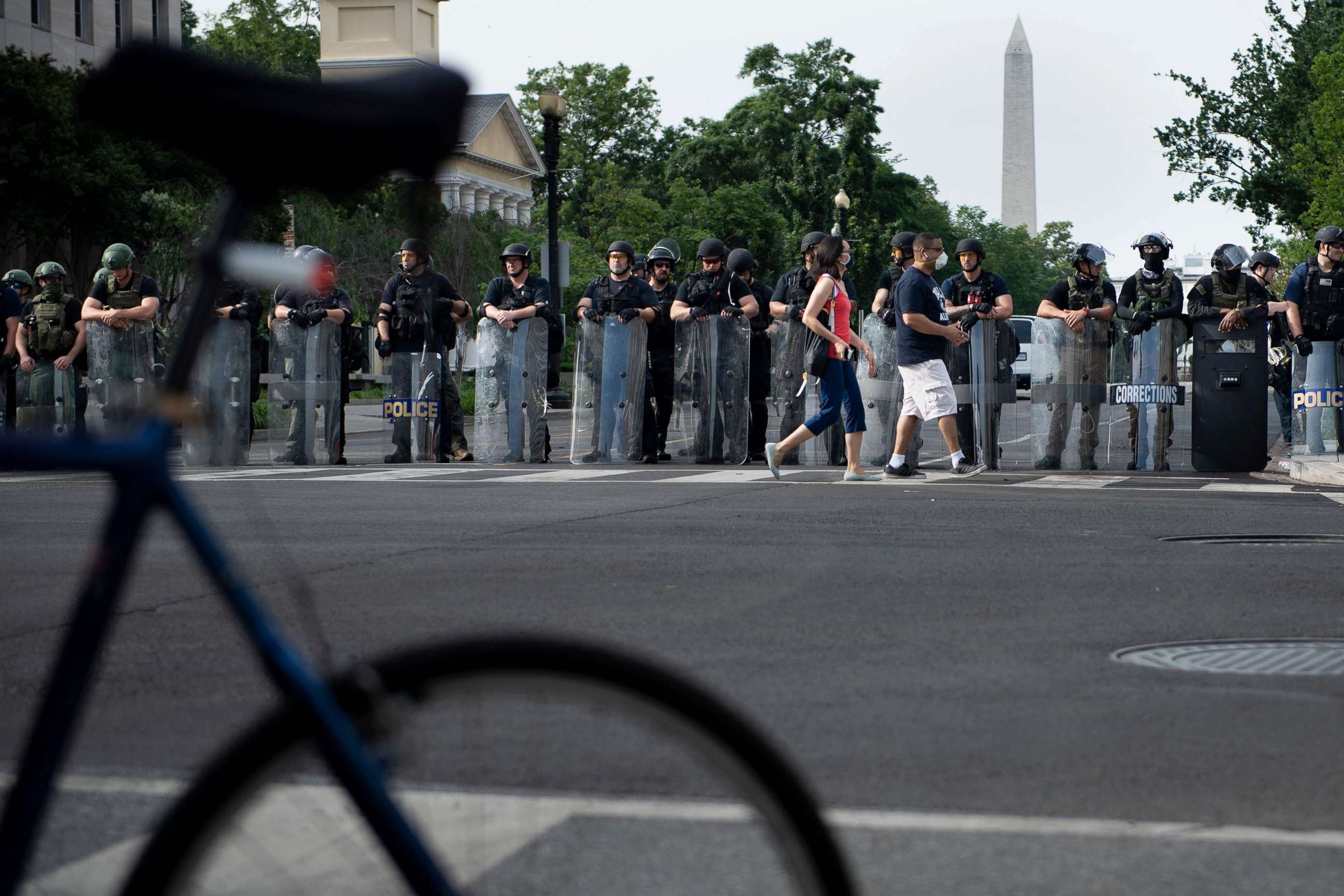 PHOTO: Members of the Federal Bureau of Prisons and other law enforcement block 16th Street, NW near the White House as protests over the death of George Floyd continue on June 3, 2020, in Washington.