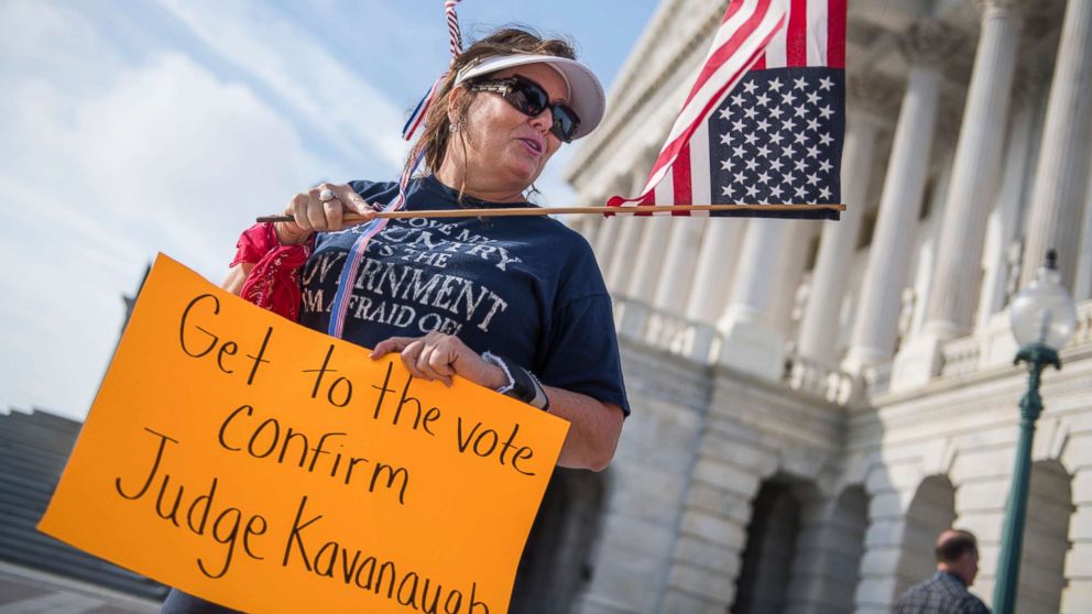 PHOTO: A woman from Virginia Beach shows her support for Supreme Court nominee Brett Kavanaugh on the East Front of the Capitol, as senators review the FBI's supplemental background check on him on Oct. 4, 2018. 