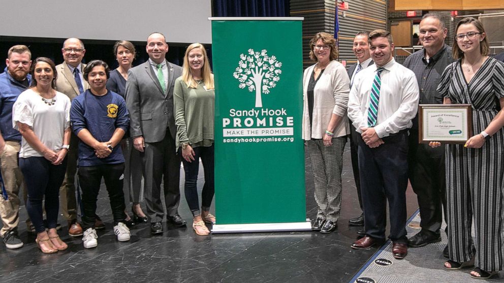 PHOTO: Sandy Hook Promise members, students and city and school officials pose for photos after an award presentation at Platt High School in Meriden, Conn., May 28, 2019.