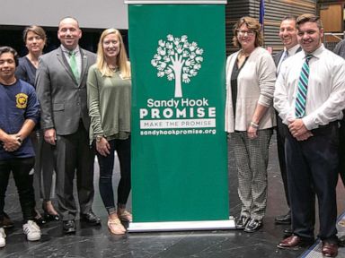PHOTO: Sandy Hook Promise members, students and city and school officials pose for photos after an award presentation at Platt High School in Meriden, Conn., May 28, 2019.
